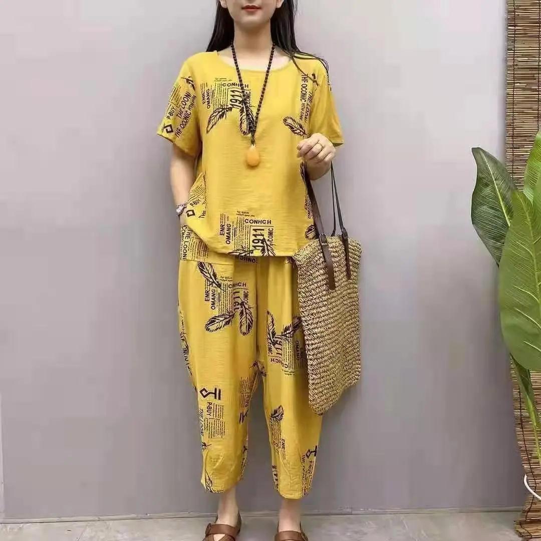 

Женский летний модный комплект: Шикарный солевой стиль двойка с облегающими брюками длиной девять точек и топом с коротким рукавом для омолаживающего, зрелого образа. XXL жёлтый