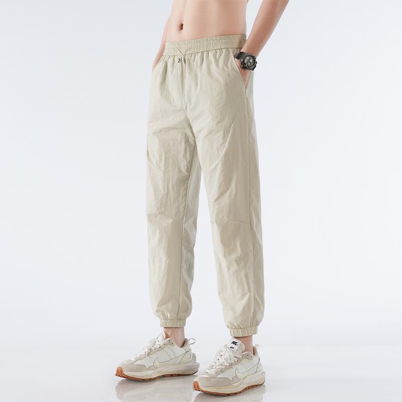 

Summer Men s Casual Ice Silk 9-Point Trousers for Youth Korean Versatile Loose Nylon Quick Drying Sports Pants 5XL абрикосовий