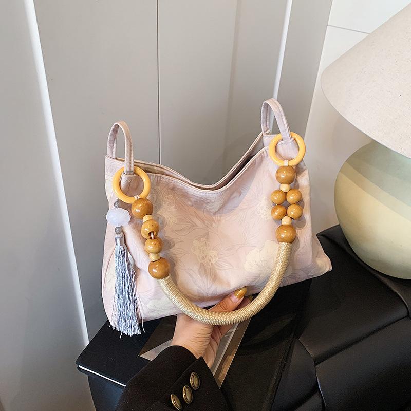 

New Chinese bag women s 2025 new fashion versatile casual shoulder bag large capacity fashion commuter armpit bag