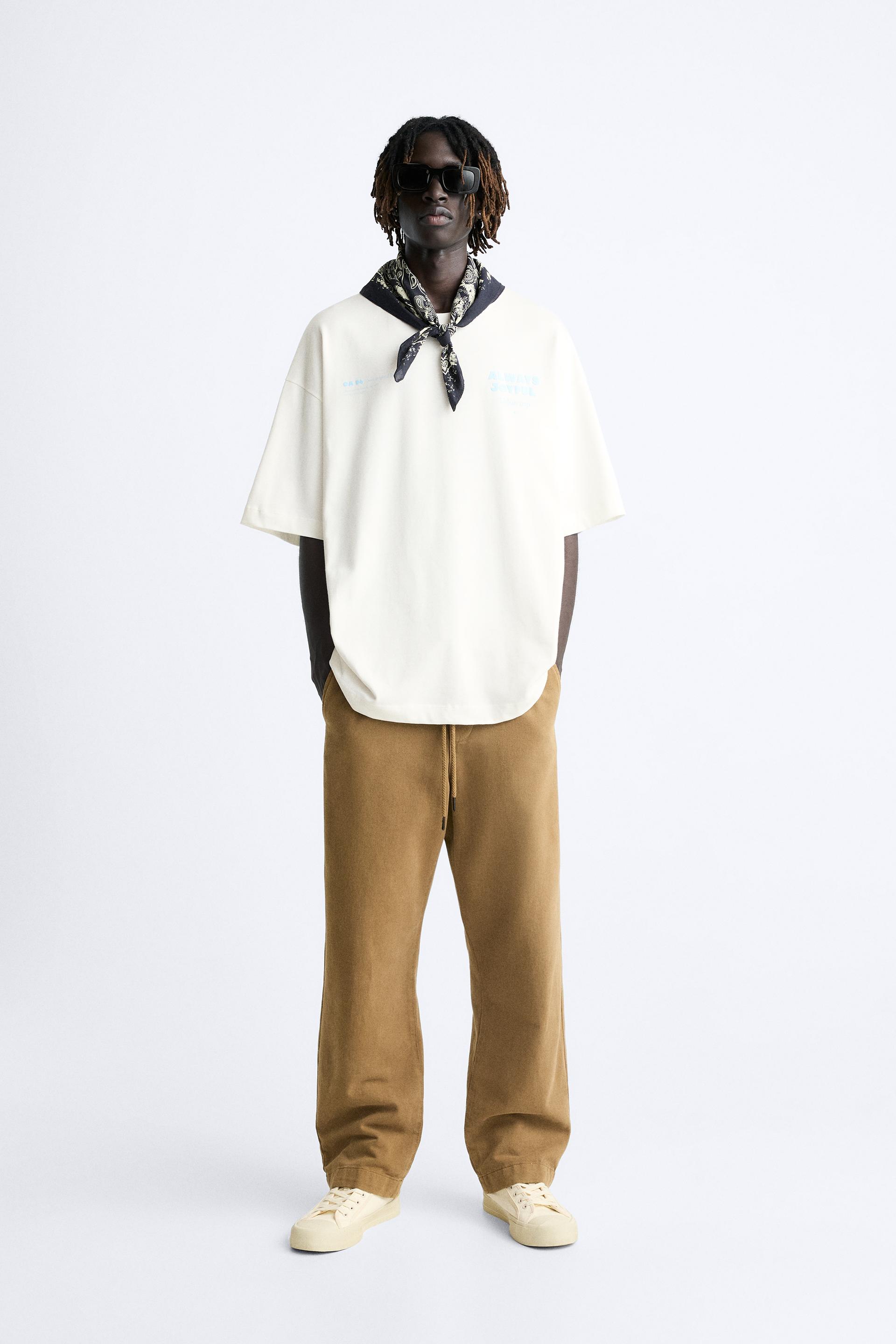 

ФУТБОЛКА С ПРИНТОМ СЛОГАНОВ