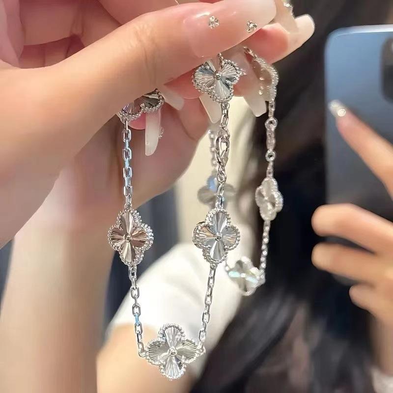 Bracelet trèfle à quatre feuilles, léger, luxueux, design de niche féminin, bracelet porte-bonheur à cinq fleurs