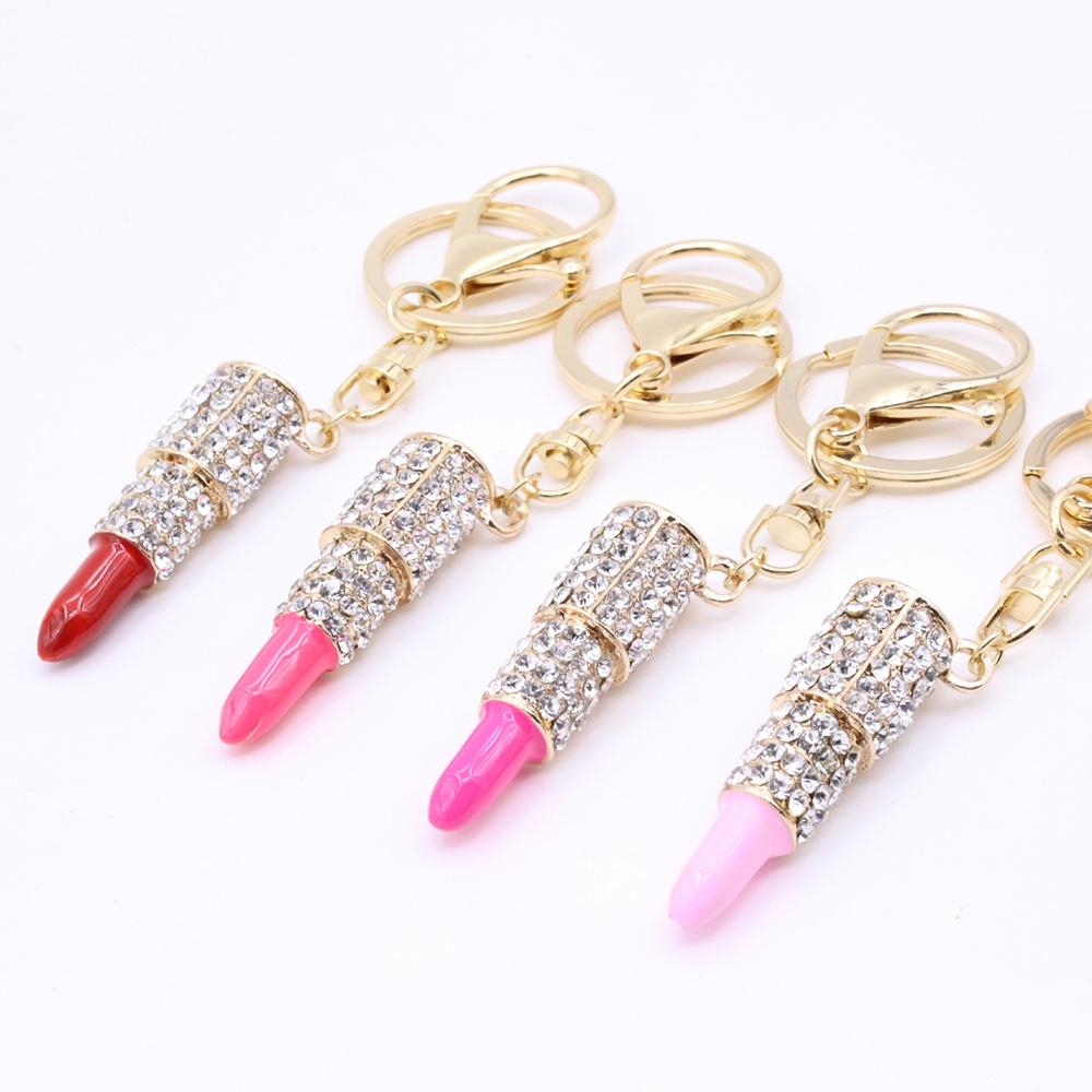 Eleganter Kristall-Strass Lippenstift Schlüsselanhänger Anhänger mit hochwertiger Zinklegierungskonstruktion