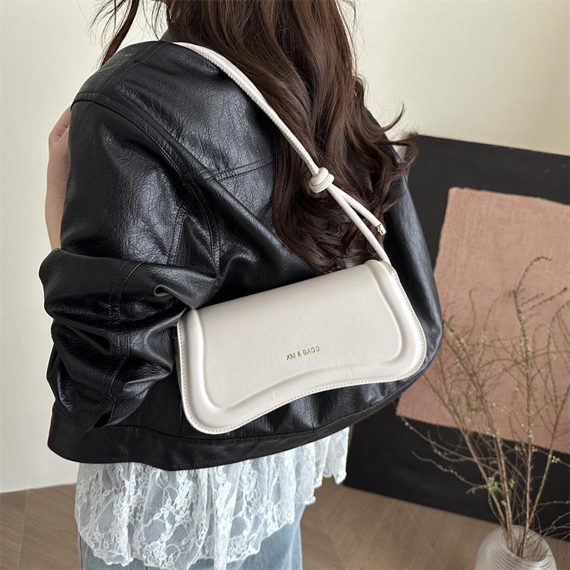 Sac à bandoulière décontracté pour les trajets quotidiens sac d'aisselle sac design de niche pour femmes été nouvelle mode sac bandoulière mode
