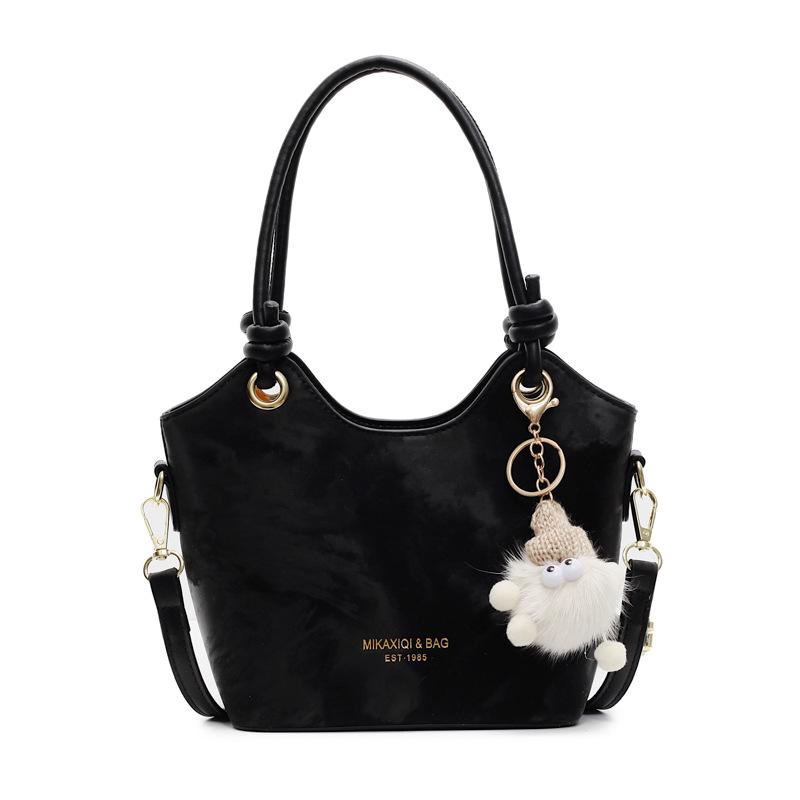 Korean Version of Fashionable Personality Commuting Simple Wind Hand Carrying Bucket Bag Women's Casual Versatile Niche Design Messenger Bag