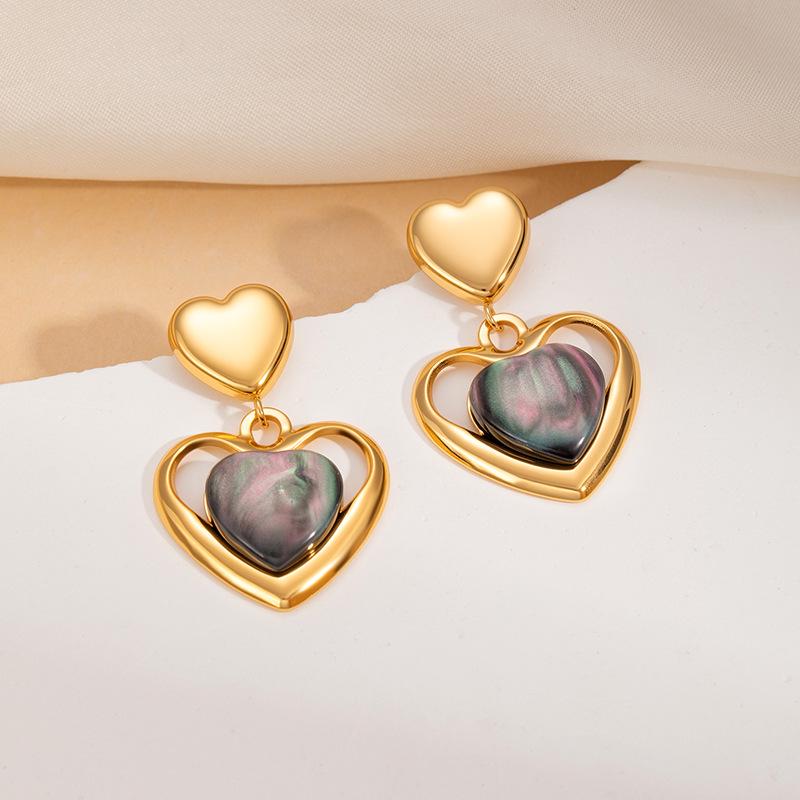European & American Titanium Heart Cat's Eye Earrings - Hollow Exaggerated Design, Versatile and Exquisite Women's Jewelry