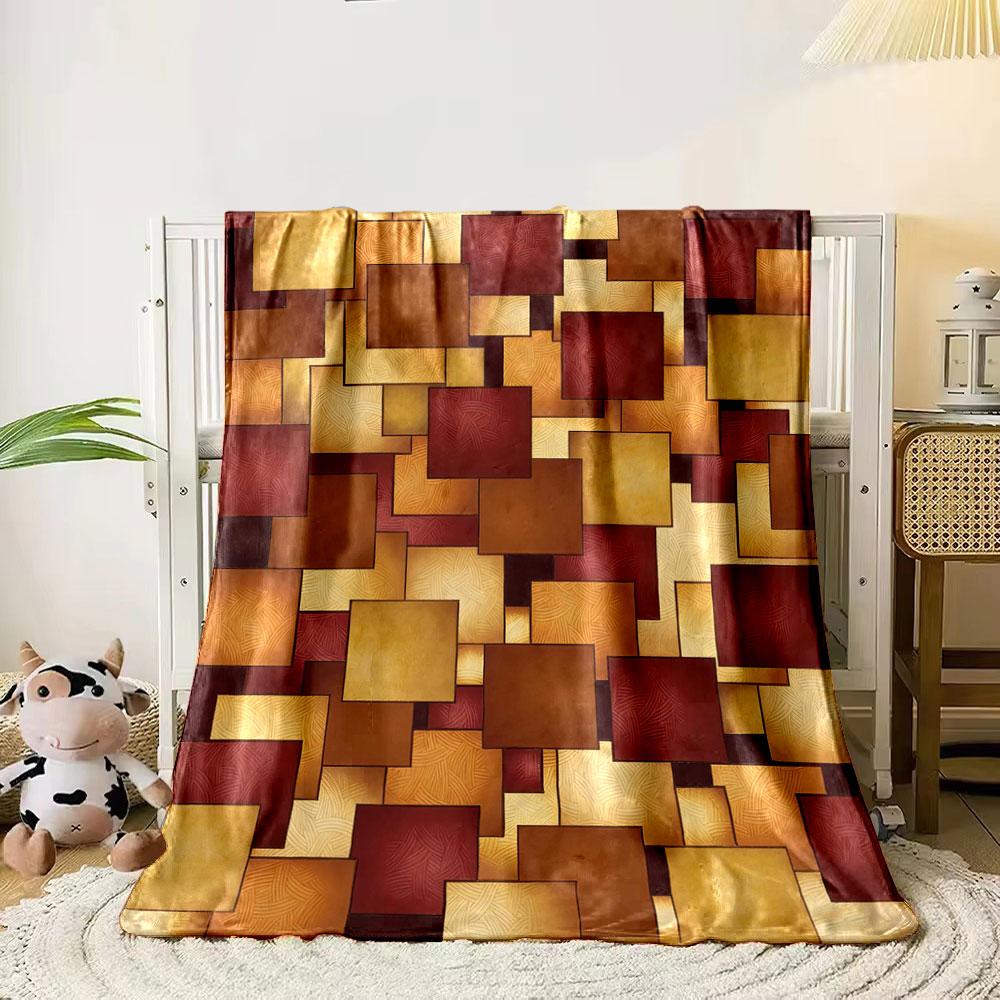 

Overlapping squares in red, gold, and brown tones with subtle textures. for all seasons blanket lunch break throw gift 80cm x 120cm