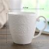 Europejski biały porcelanowy tłoczony różany kubek do kawy porcelana kostna Vintage śniadanie kubek do mleka biurowy kubek do herbaty Drinkware