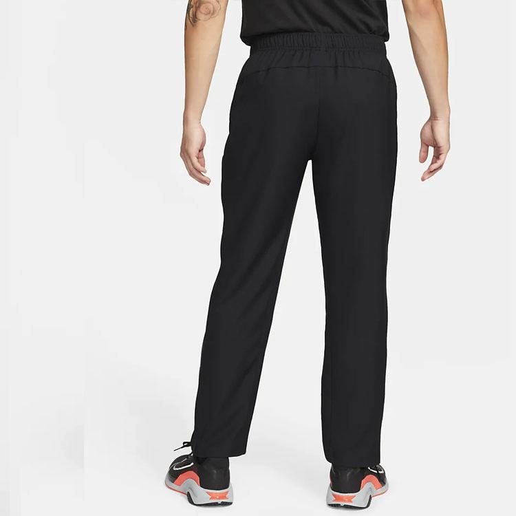 Nike Dri-Fit Team Solid Logo tepláky s rovnými nohavicemi pánské kalhoty černé DM6627-010