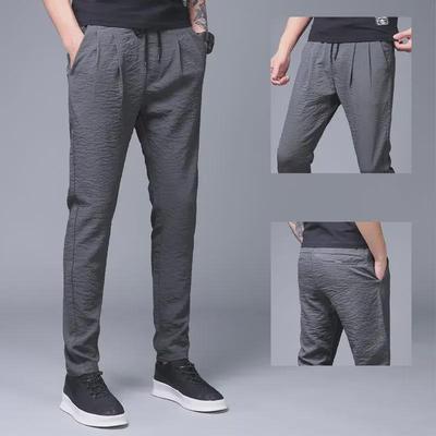 Pantaloni larghi da uomo in seta ghiaccio 2023: Pantaloni dritti a nove punti estivi casual leggeri in stile coreano di tendenza.