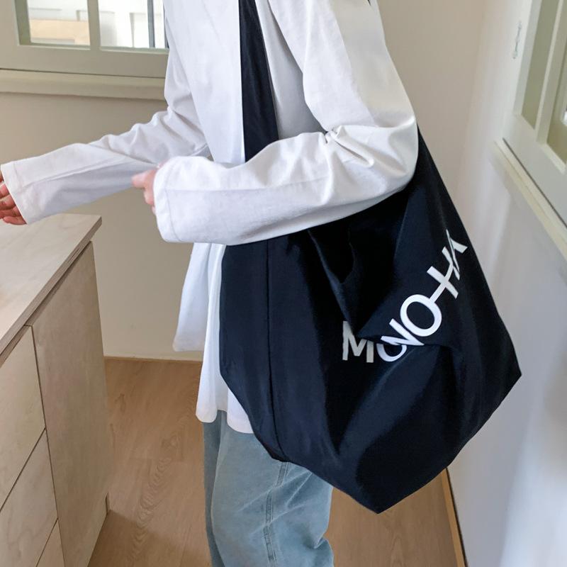 Lazy wind casual large-capacity underarm bag women's 2025 new letter-printed canvas bag shoulder bag