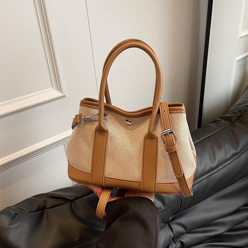 

New contrasting color bucket bag women s commuter shoulder messenger bag bag large-capacity casual niche handbag