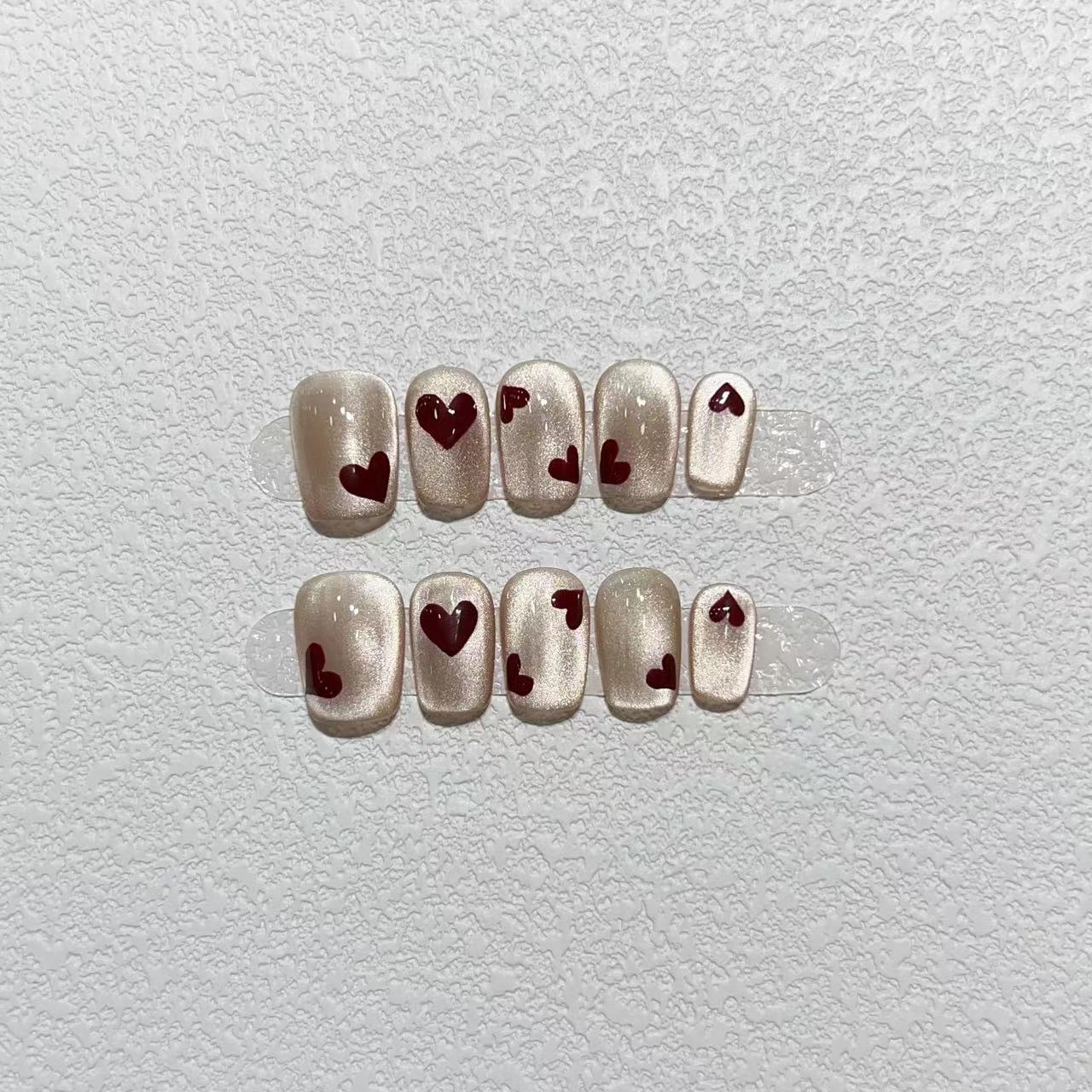 

Новогодний маникюр Чисто ручной работы Носимые накладные ногти Ручная работа Высококлассный Инс Белый Нюдовый Кошачий глаз Короткий Любовь Large L