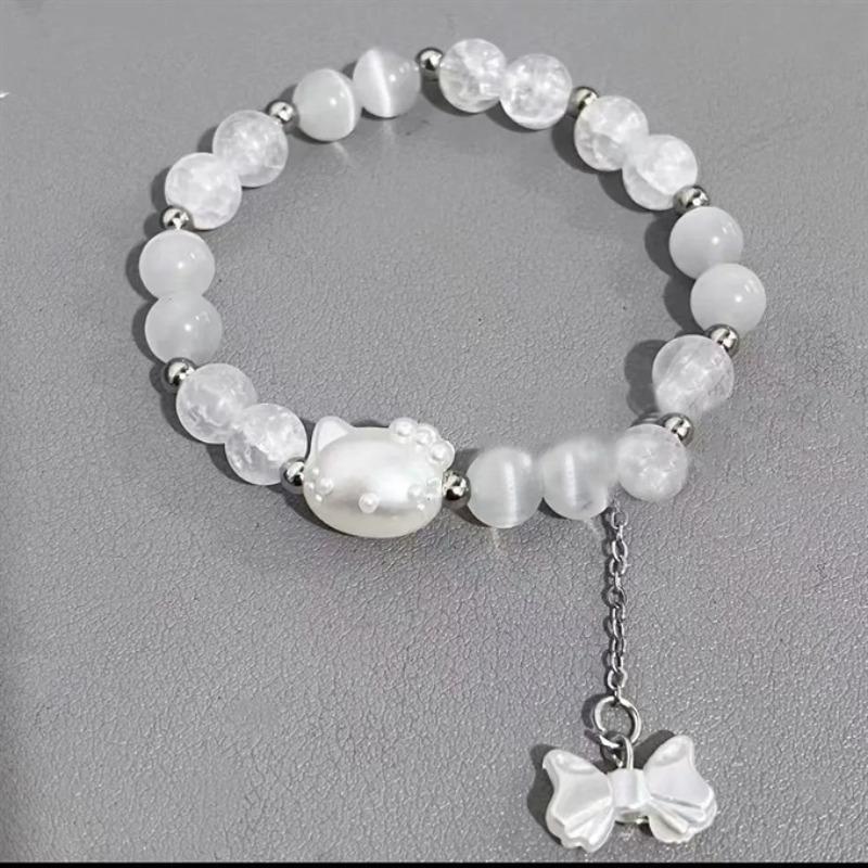 The new kt cat HelloKitty bow wind bracelet handmade beaded bracelet is a gift for girls' girlfriends.