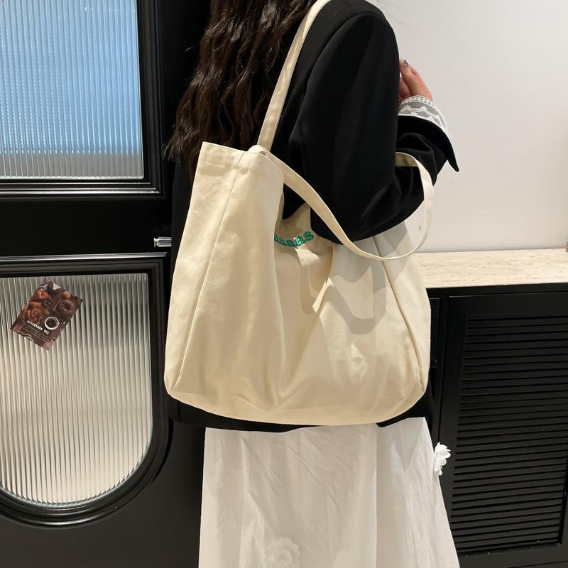 2025 new ins commuter color niche large-capacity student canvas bag simple daily back leisure tote bag