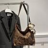 Niche Super Fire Leopard Print Canvas Bag Women 2025 New Doll Pendant Tote Bag Large Capacity Lightweight Shopping Bag