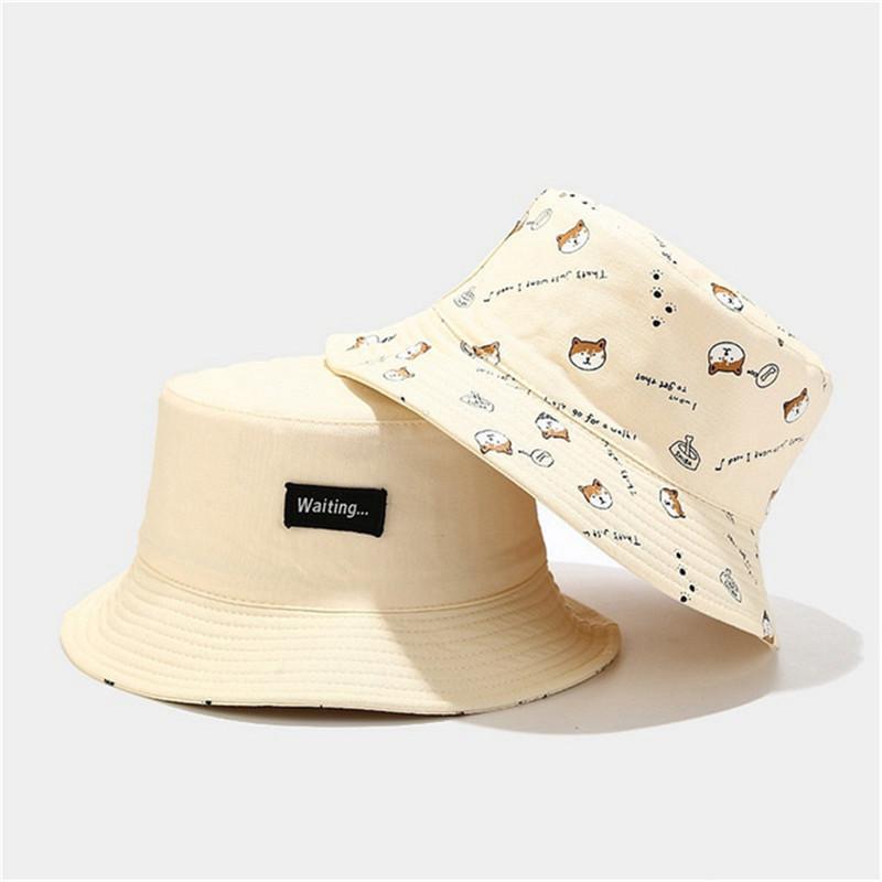 LDSLYJR Chapeau seau en coton double face imprimé chien de dessin animé Chapeau de pêcheur Chapeau de voyage d'extérieur Casquette de soleil pour hommes et femmes 261 (Beige,56-60cm wear) beige