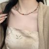 Retro beaded necklace women's ins niche design rice bead collarbone chain versatile high-end antique necklace accessories