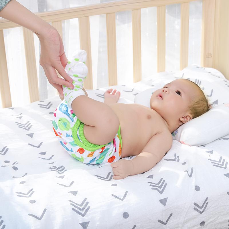 Il cuscino in cotone per neonato previene il posizionatore del cuscino antirollio per neonato a testa piatta