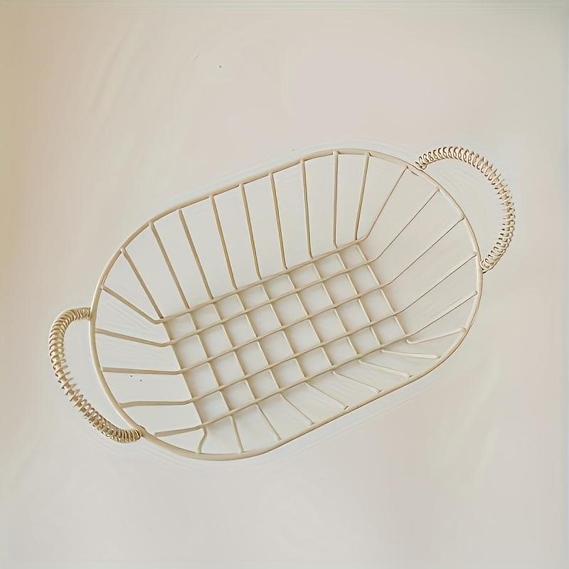 An elegant metal wire basket with stylish handles - featuring a classic black grid design, suitable for home and kitchen storage