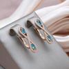 Kinel Blue Zircon Symmetric Rose Gold Color Earrings