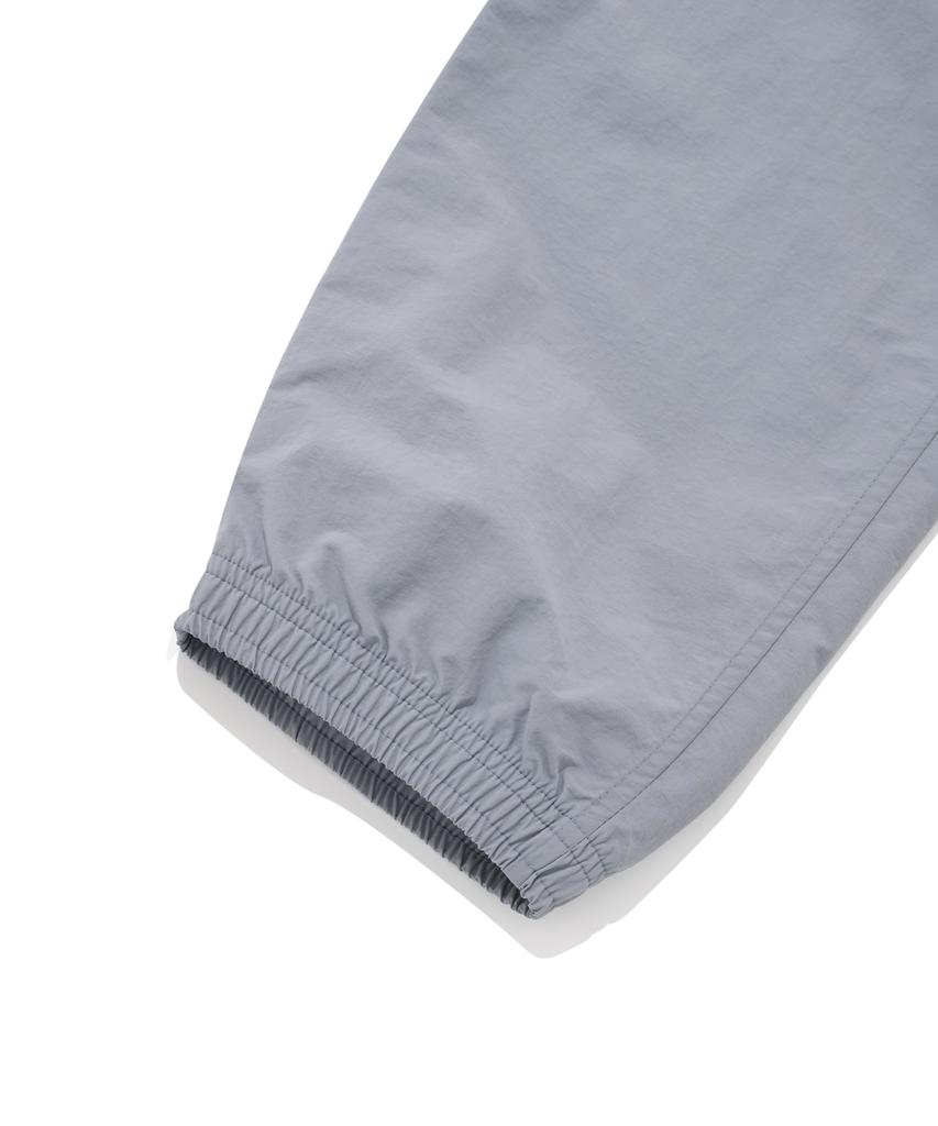 COVERNAT Windbreaker Jogger Pants Light Blue