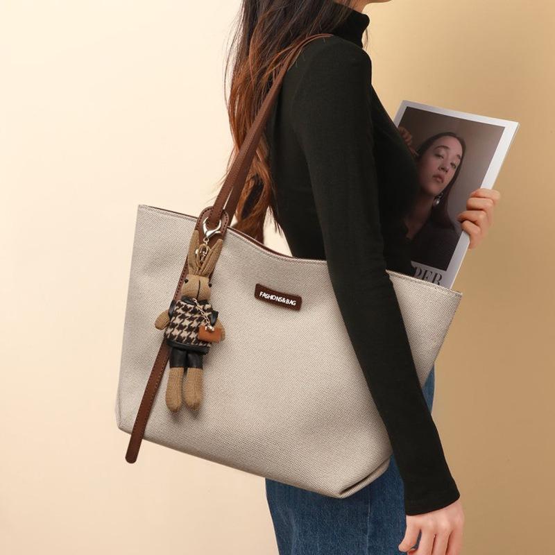 Casual large-capacity bag women's bag spring and summer new versatile canvas bag commuter shoulder bag simple tote bag