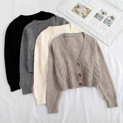 Maglione di plastica sottile a vita alta stile corto da donna 2021 Primavera nuovo cardigan lavorato a maglia monopetto twist piccola giacca