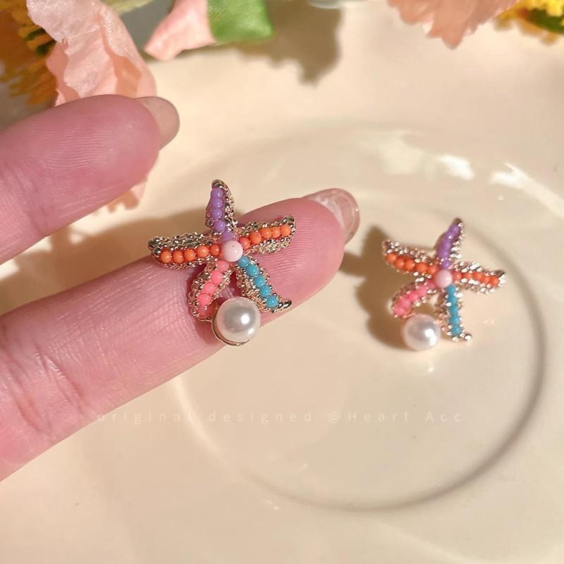 

2025 New Romantic Seaside Vacation Style Starfish Earrings Women Classic Imitation Pearl Stud Earring Female Fashion Ear Zircon