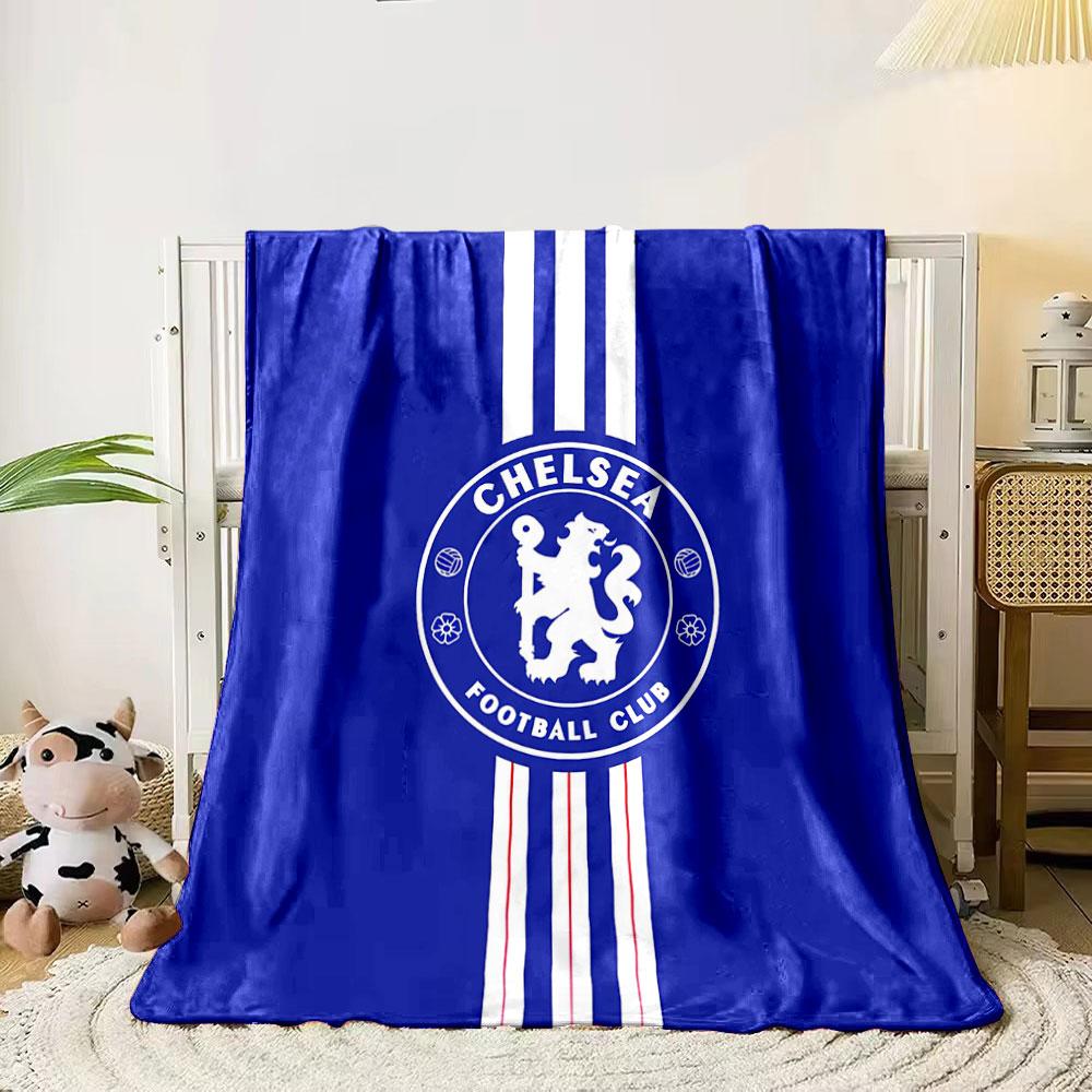 

Blue background with white stripes and a lion crest in a circular logo. for all seasons blanket lunch break throw gift 80cm x 120cm