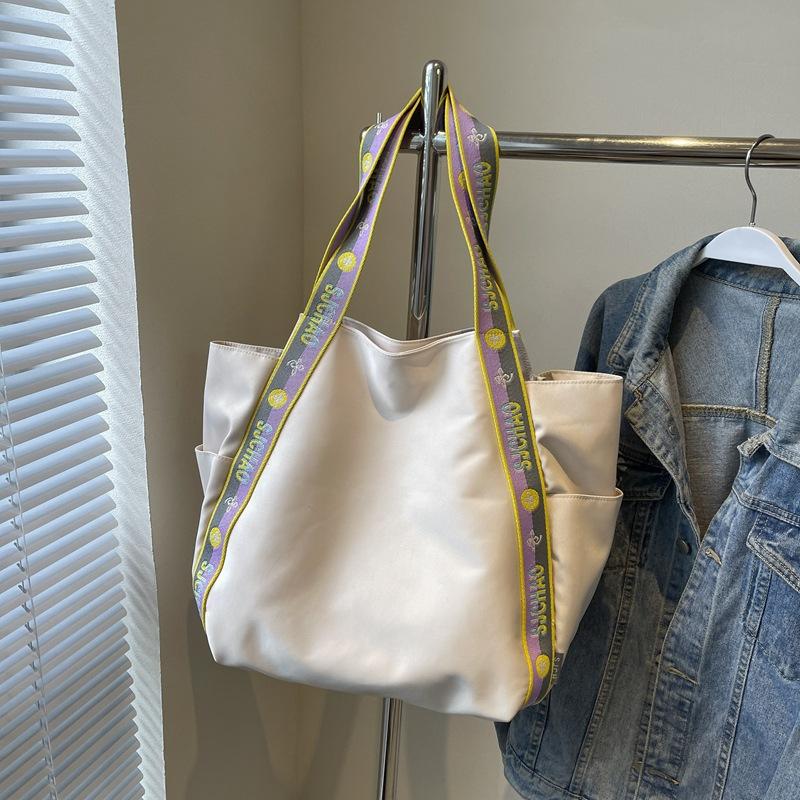 

Сумка Niche большой вместимости женская 2025 новая портативная нейлоновая сумка для покупок на выход большая сумка через плечо