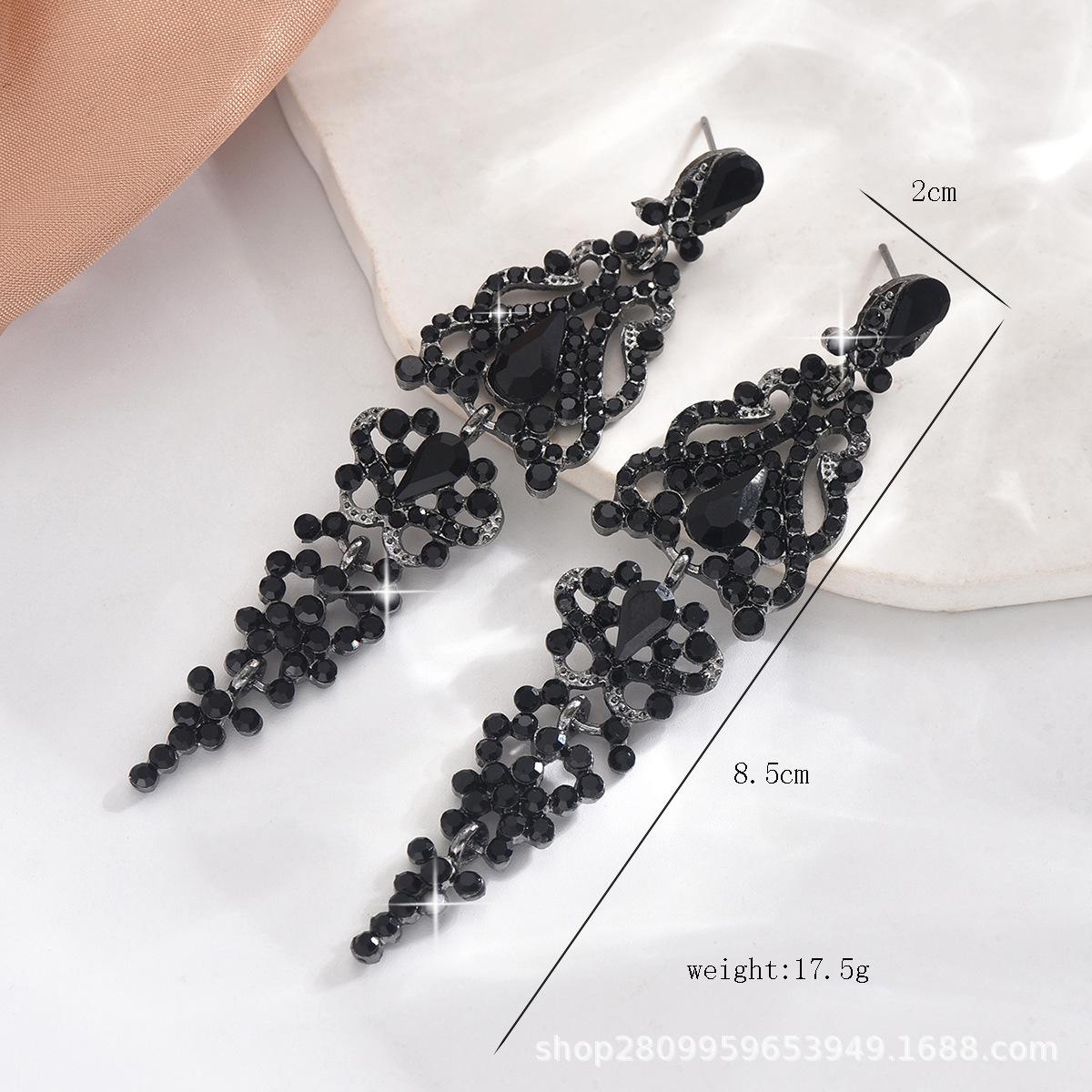

Элегантные длинные свадебные серьги с кристаллами чёрный