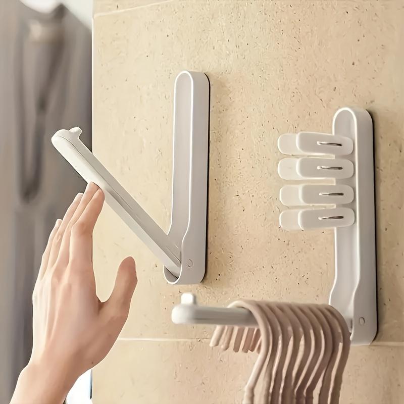 A Compact Hanger System, A Foldable Hanging Storage Rack, A Hook Storage Organizer, And a Hanger Organizer, Drying Rack