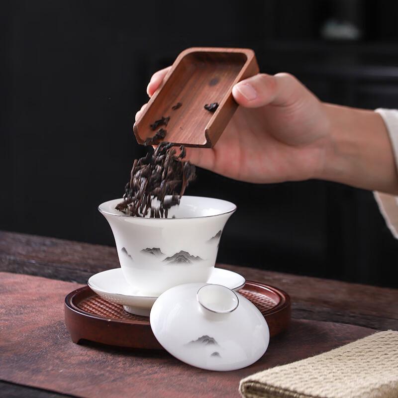 Muyi Mutton Fat Jade Style Ceramic Tea Set with Landscape Ink Design