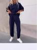 2026 Women's Autumn Casual Two-Piece Set: Solid Color Crew Neck Top and Nine-Point Pants.