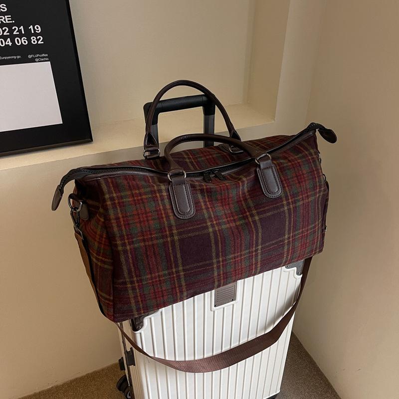Nueva versión coreana de bolsa de viaje a cuadros de moda ins de gran capacidad se puede guardar al hombro cruzada deportiva para yoga
