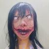 Halloween haunted house costume: long-haired female ghost, Janki, with a grotesque, terrifying, and disgusting mask, resembling a mutated zombie