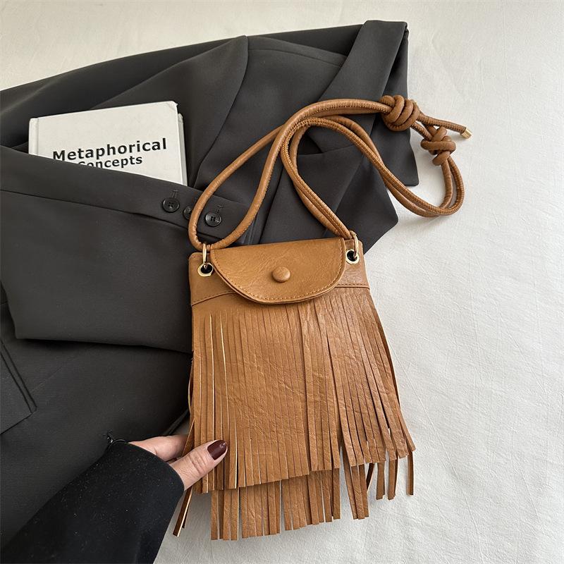 

Кисточка французский тренд текстура модная женская сумка 2025 новая матовая сумка-ведро простая женская сумка сумка через плечо коричневый