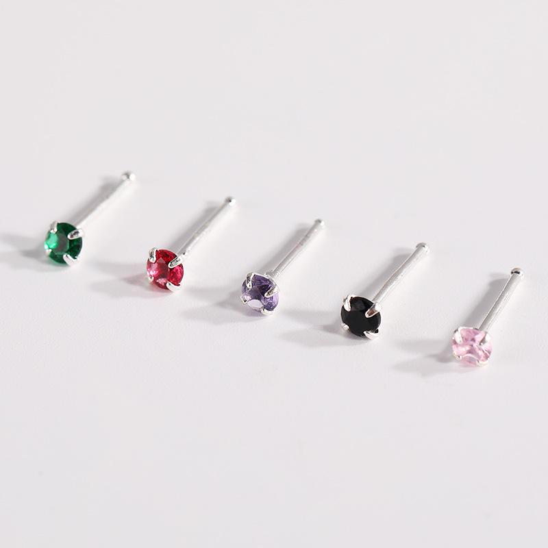 Elegant White Stone Nose Studs: Chic and Trendy Piercing Accessories for Ladies.