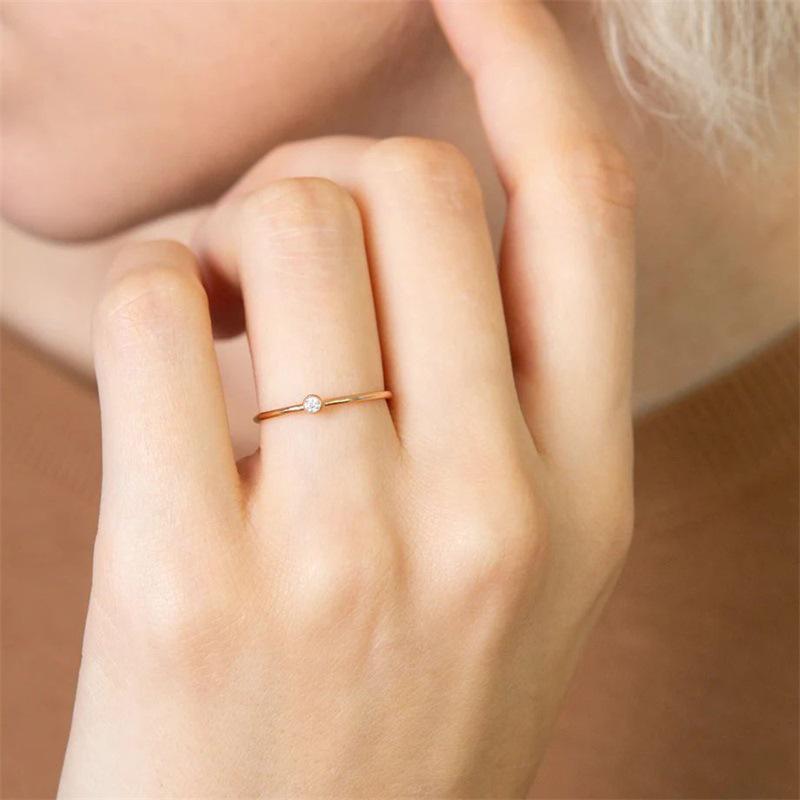 eManco Gold-Plated Non-Constricting Ring for Women - Thin Band with Tiny Diamond Accents and December Birthstone