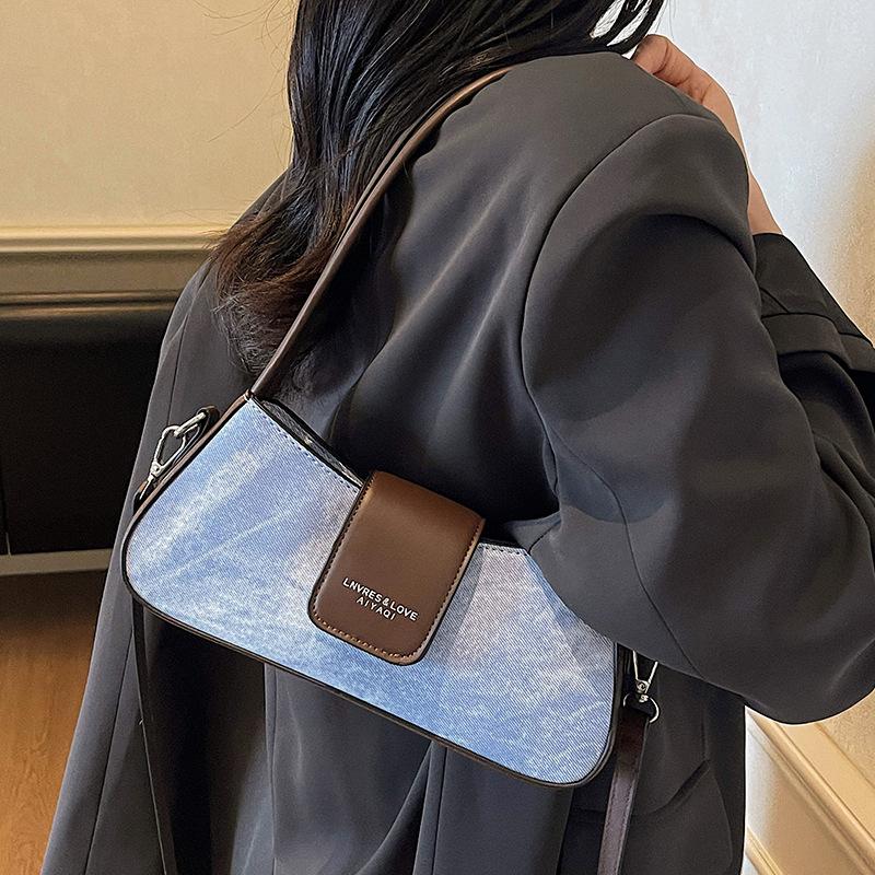 Textured small bag women's new women's versatile messenger bag French niche single shoulder underarm bag French stick bag