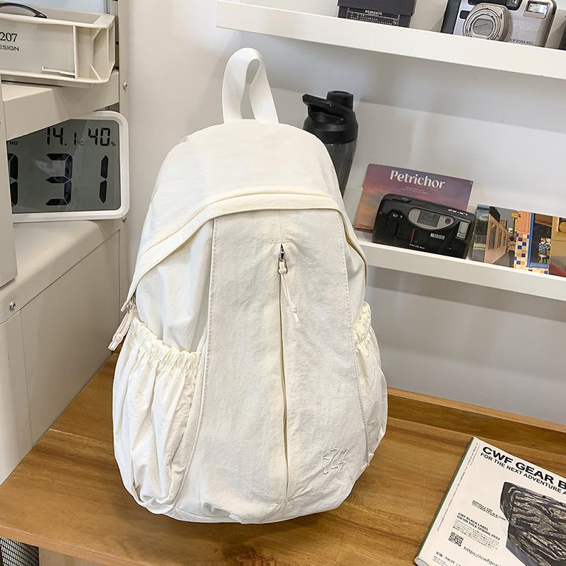 Japanese casual art canvas backpack ins simple fold wash water women's schoolbag Internet celebrity fashion nylon backpack