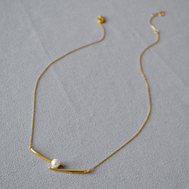 

Gold-Plated Brass Necklace with Cross, Smile, and Pearl - Japanese and Korean Inspired Simple Luxury Design