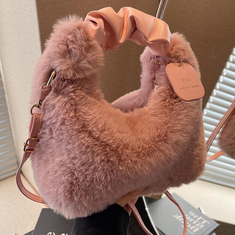 

Autumn and winter niche high-end handbag women s winter 2024 new versatile fashion shoulder Mao Mao messenger bag рожевий