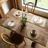 Baumwoll- und Leinenstoff Hitzebeständiger Punkt Westliche Speisenmatte Untersetzer Gewebte Leinen-Baumwollseil-Platzmatte Gourmet-Hintergrund-Shooting
