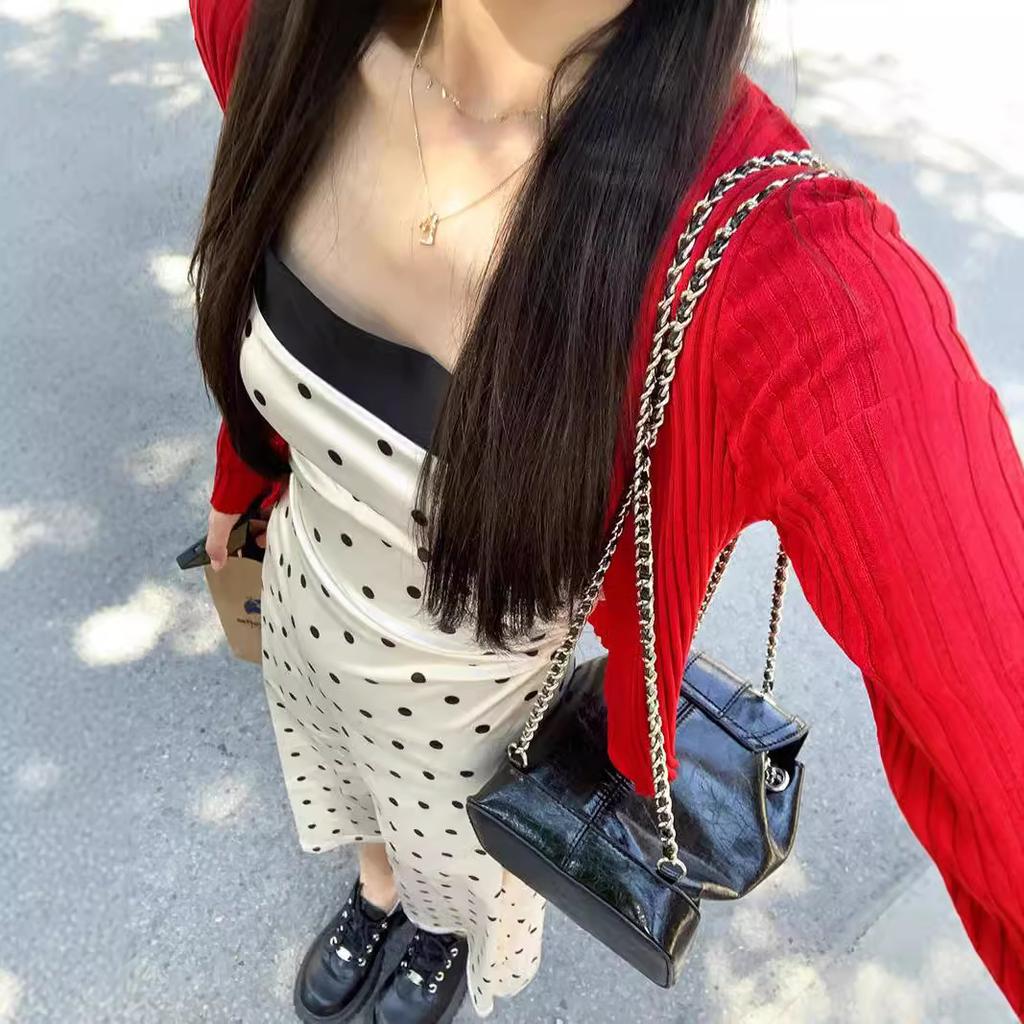 Pure desire style temperament polka dot suspender dress women's summer new design sense splicing waist showing thin long skirt tide