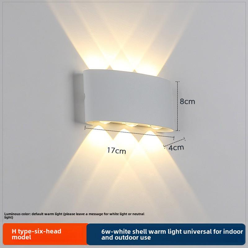 LED Outdoor Four-Leaf Clover Wall Light - Up and Down Beam Decoration for Garden and Exterior Walls.