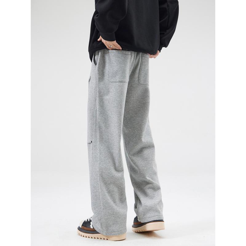 | Autumn and winter new double knee rivets irregular splicing design sweatpants American trendy brand loose drape pants