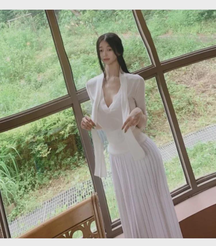 Koreanischer Dongdaemun Slim Fit Strickpullover mit halblangen Ärmeln und Schleifendesign für Damen