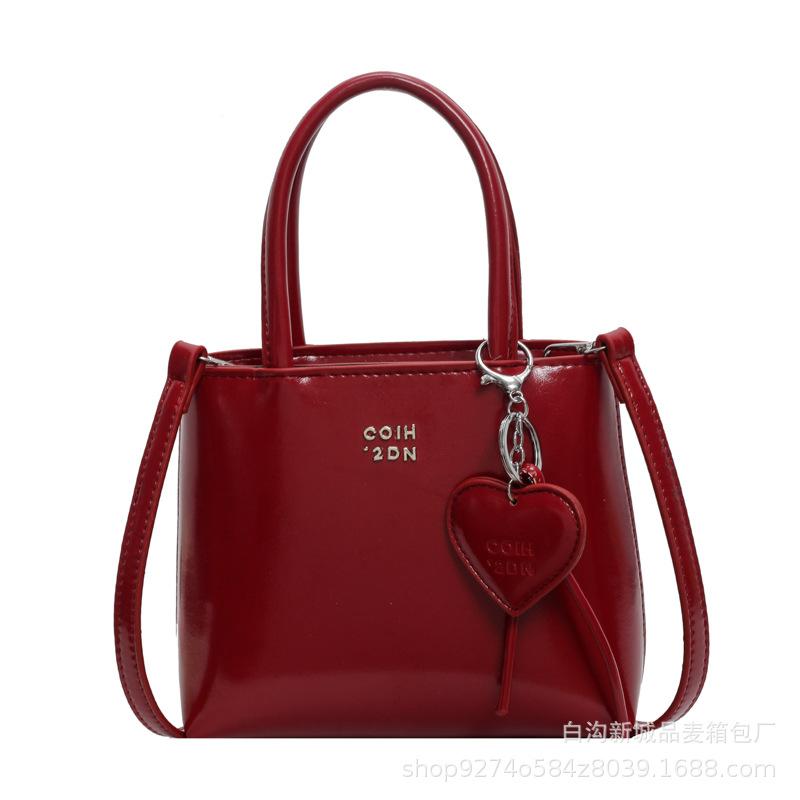 Popular foreign niche design bag women's 2025 new portable bucket bag fashionable commuter shoulder crossbody bag