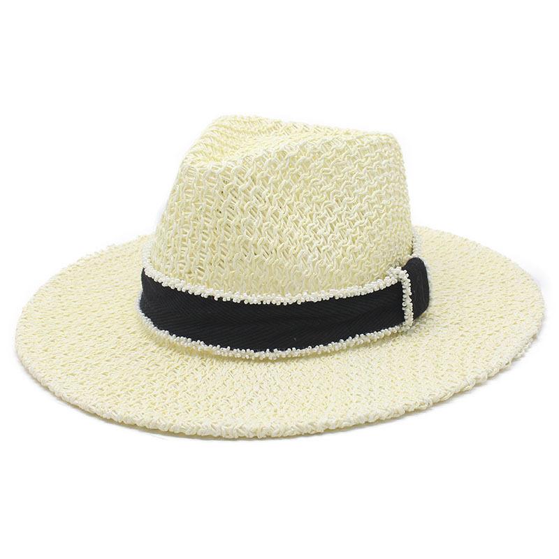 New product Xiaoxiangfeng hollow top hat beads ribbon British style handsome straw hat beach vacation sun hat